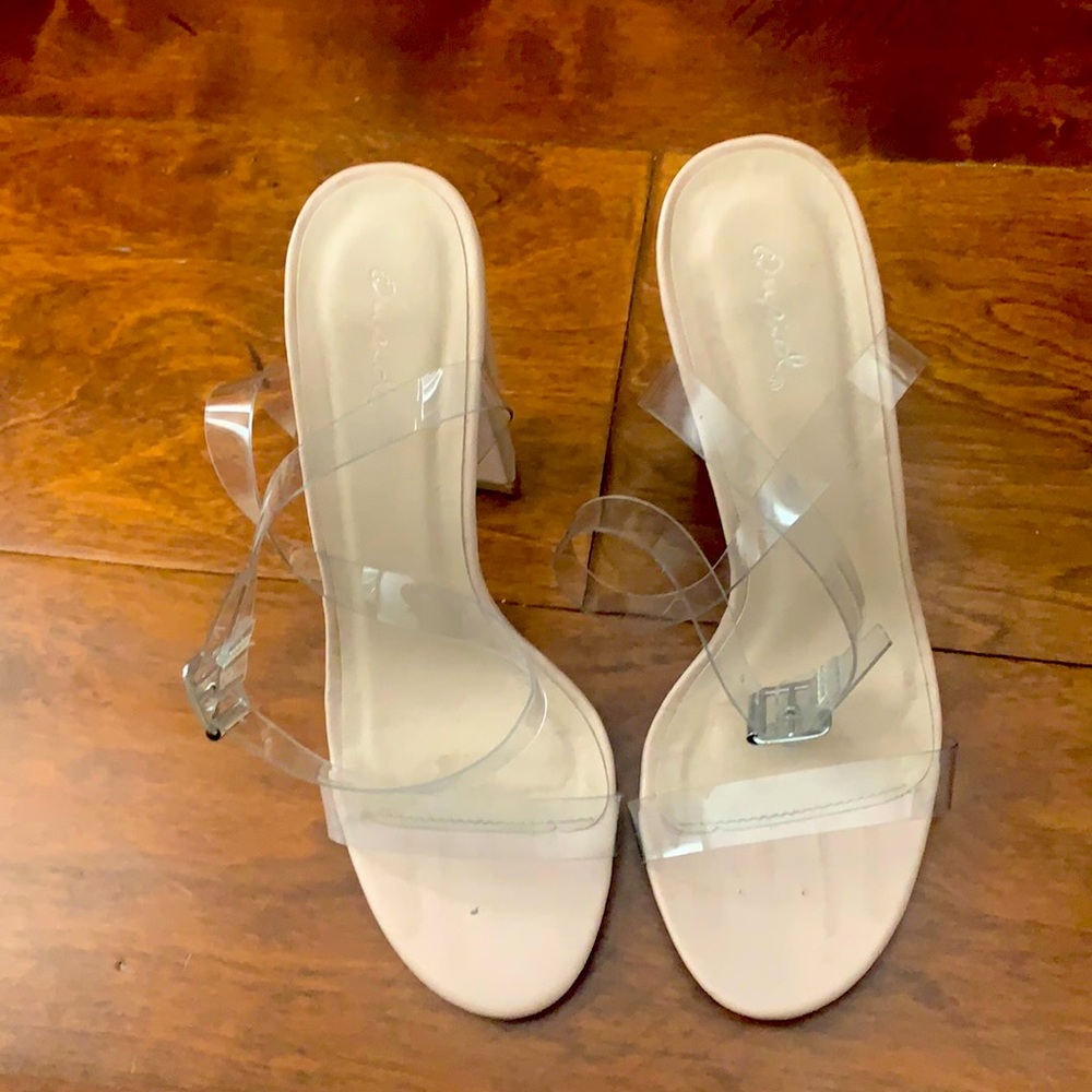 Tan colored shoes with clear straps